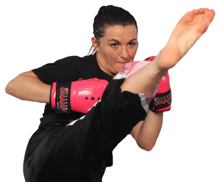 Woman in gloves doing a high kick